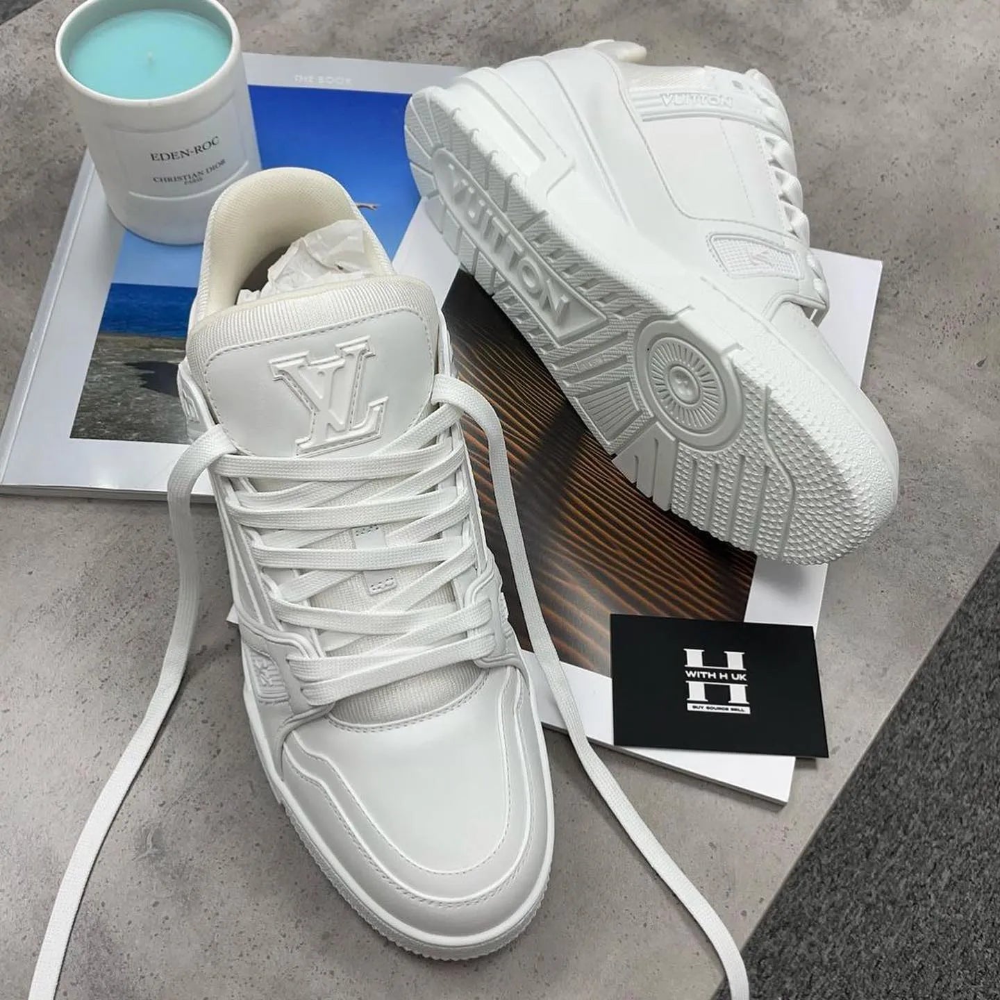 Triple white Monogram Trainers